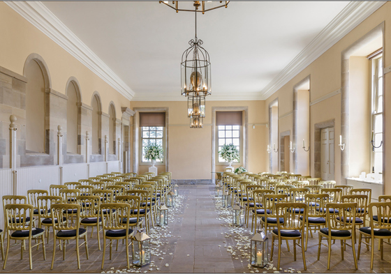 Ceremony room with gold chairs